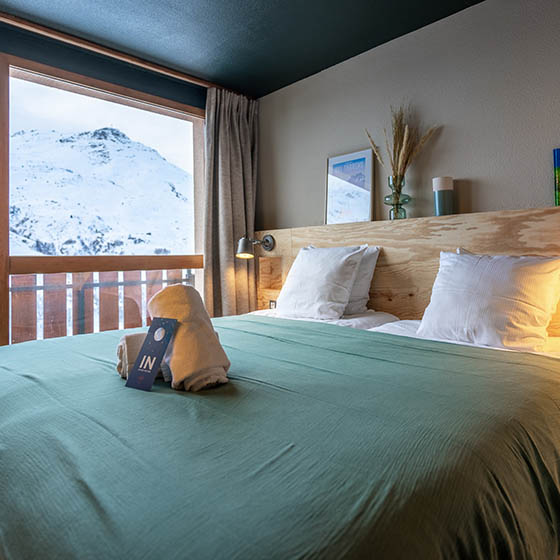 Bedroom at the HO36 Les Menuires in the French Alps