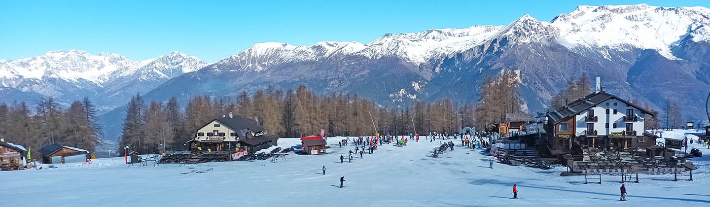 Panorama view of Sauze d'Oulx's main ski area and ESF meeting point