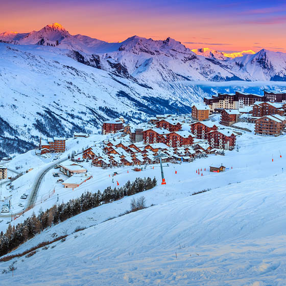 Majestic winter sunset in Les Menuires, France